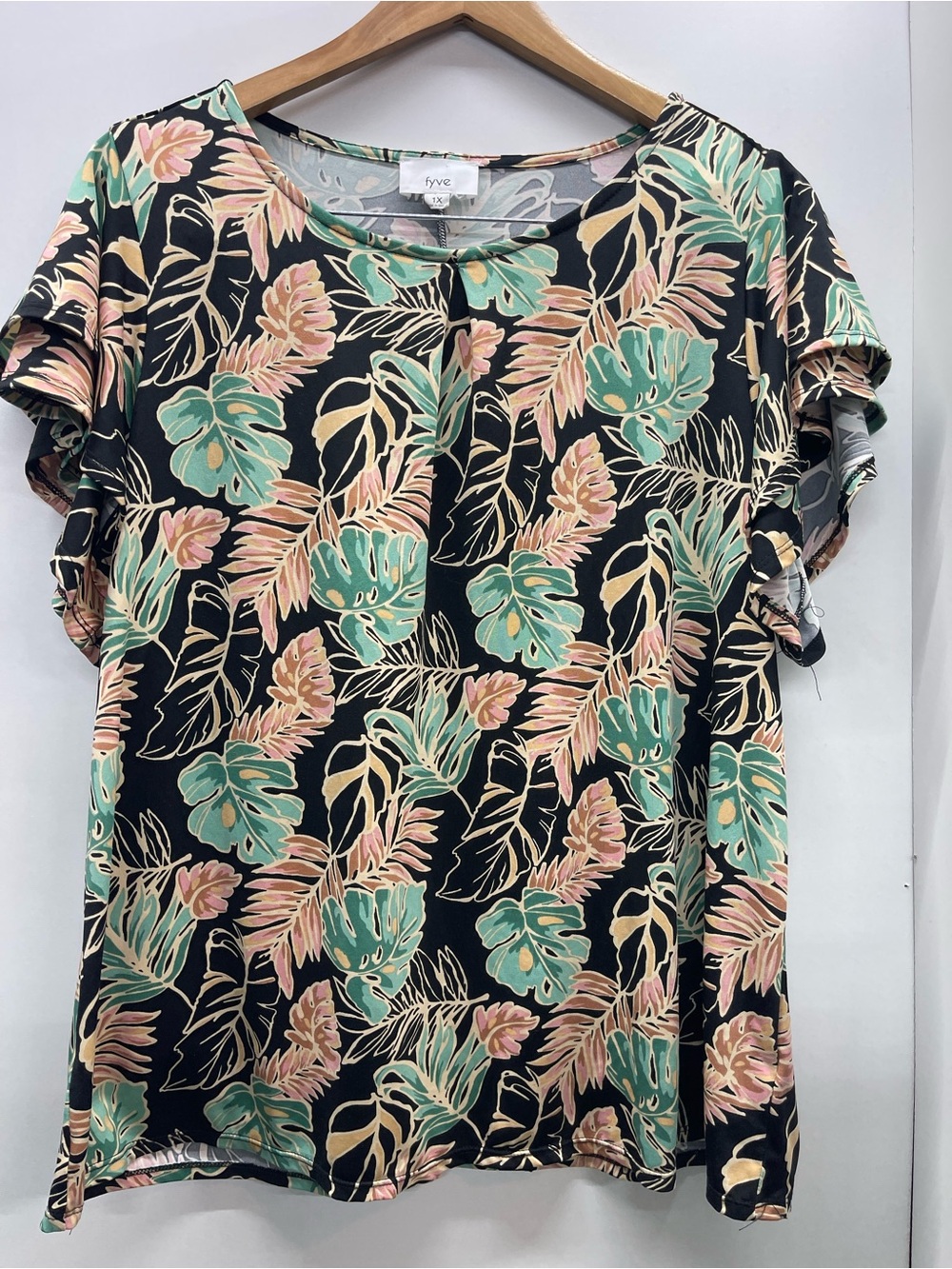 Fyve brand plus size black blouse with green and pink leaves and ruffle sleeves